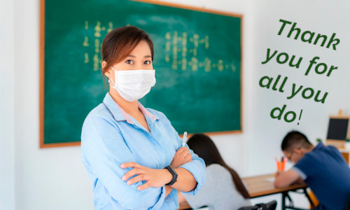 Teacher with mask chalboard and students